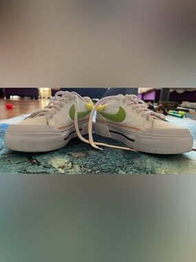 Nike feel love white with green swoosh